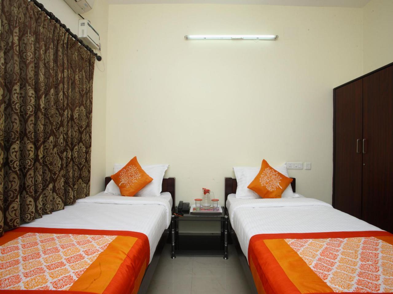 Oyo 10465 Koyambedu Chennai Hotel Bagian luar foto